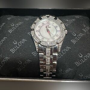 Bulova Women’s Watch, silver, needs battery, has extra links